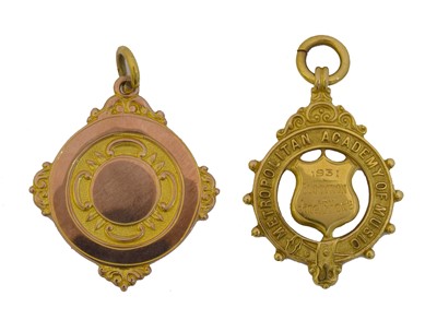 Lot 84 - Musical interest - Two 1930s 9ct gold medallions.