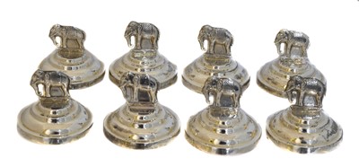 Lot 68 - A set of eight elephant placeholders.