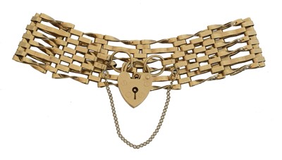 Lot 13 - A 9ct gold gate link bracelet.