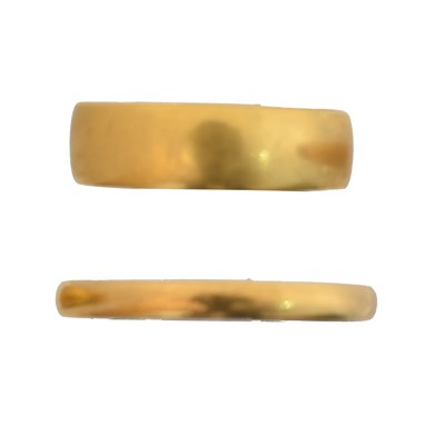 Lot 71 - Two 22ct gold band rings.
