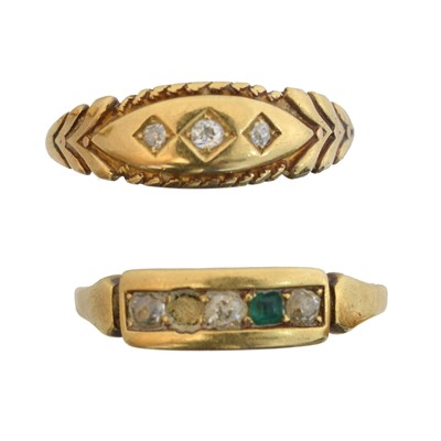 Lot 103 - Two gem-set dress rings.