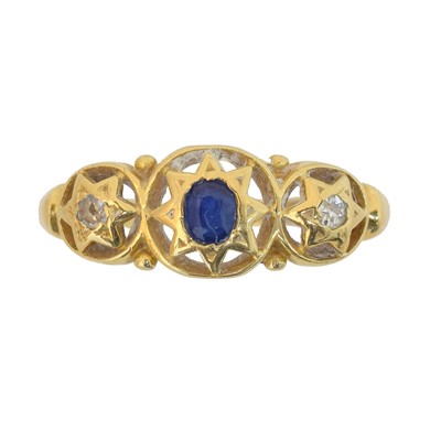 Lot 169 - An 18ct gold sapphire and diamond three stone ring.
