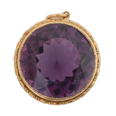 Lot 67 - A 9ct gold amethyst pendant.