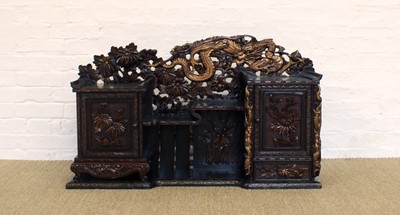 Lot 331 - An Early 20th Century Japanese Carved and Pierced Hardwood Desktop Cabinet