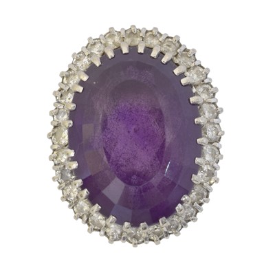 Lot 151 - An amethyst and diamond cluster ring.