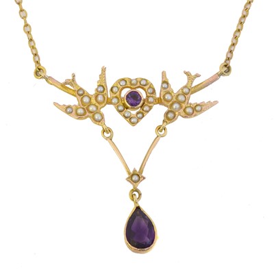 Lot 74 - An early 20th century amethyst and split pearl necklace.