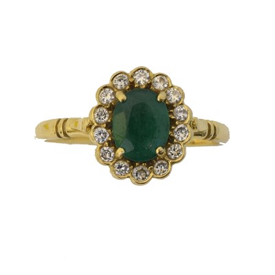 Lot 140 - An 18ct gold emerald and diamond cluster ring.