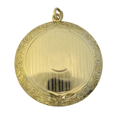 Lot 69 - An American 14K compact pendant.