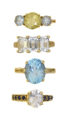 Lot 111 - Four 9ct gold gem-set dress rings.