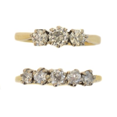 Lot 182 - Two 18ct gold diamond dress rings.