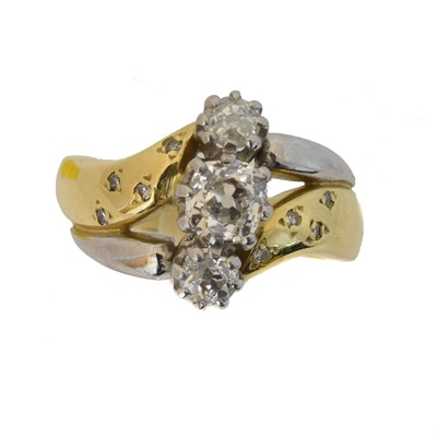 Lot 131 - An 18ct gold diamond three stone ring.