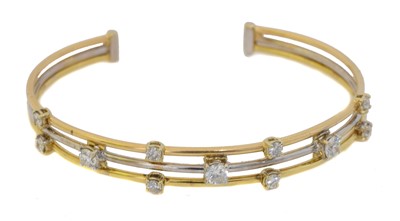 Lot 33 - A diamond bangle.