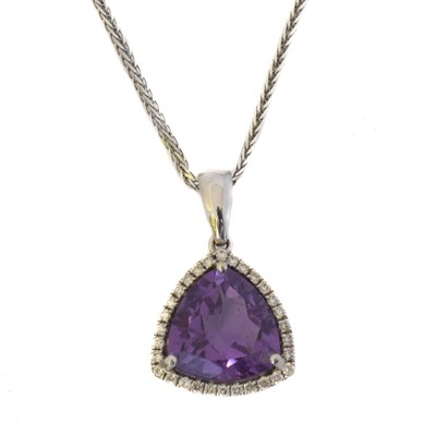 Lot 72 - An 18ct gold amethyst and diamond pendant.