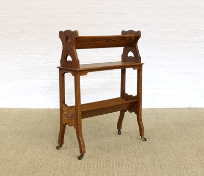 Lot 234 - Arts & Crafts Oak Combination Book Trough and Trolley