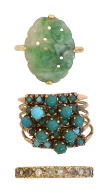 Lot 70 - Three gem-set dress rings.