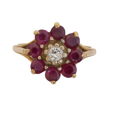Lot 93 - A ruby and diamond cluster ring.