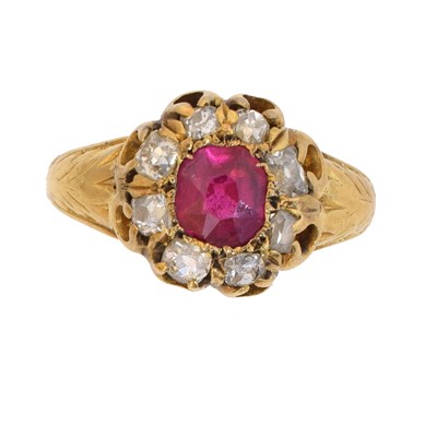 Lot 95 - A synthetic ruby and diamond cluster ring.