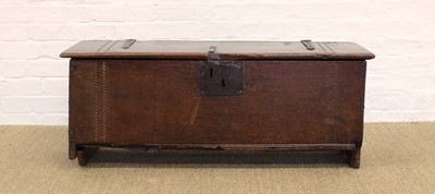 Lot 125 - An Early 17th Century Planked Oak Coffer