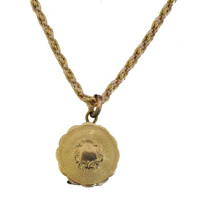 Lot 14 - A hinged locket on chain.