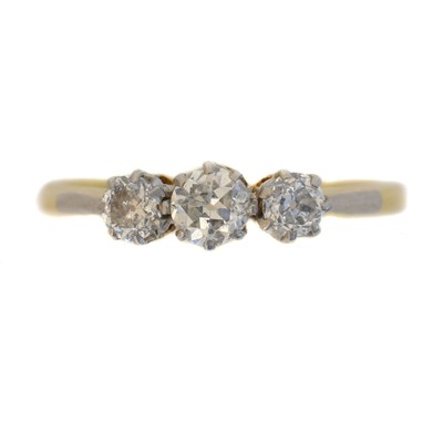 Lot 46 - A diamond three stone ring.