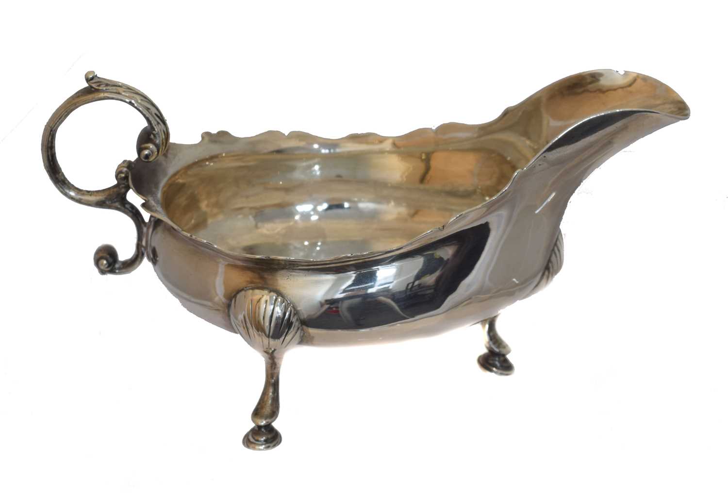 Lot 31 - A George III silver sauce boat.