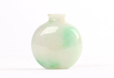 Lot 317 - A Chinese Carved Celadon Jade Snuff Bottle