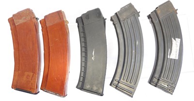 Lot 446 - Five AK magazines, including two Bakelite and...