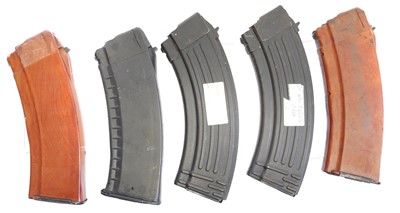 Lot 447 - Five AK magazines, including two Bakelite and...