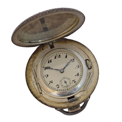 Lot 245 - A 1920s silver travel clock/pocket watch by Marvin.