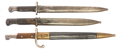 Lot 170 - Three Mauser rifle bayonets and scabbards,...
