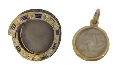 Lot 21 - A 19th century enamel portrait ring.