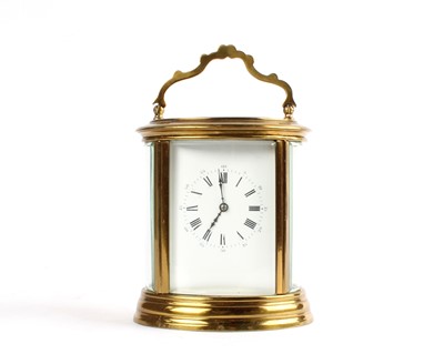 Lot 211 - A Late 19th / Early 20th Century Five-Glass Oval Brass Cased Carriage Clock