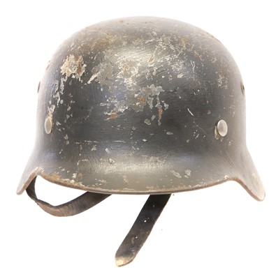Lot 187 - German WWII M42 helmet, repainted black on the...