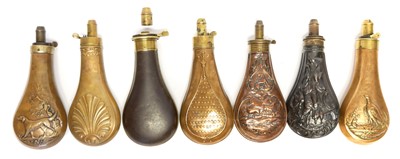 Lot 406 - Six embossed copper and brass powder flasks,...