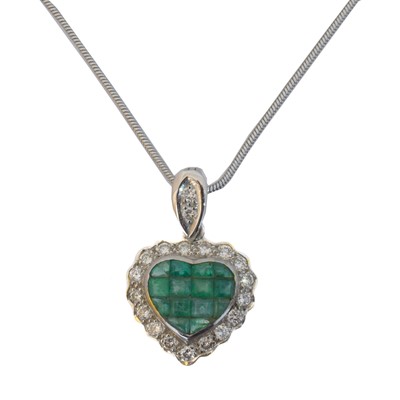 Lot 68 - An emerald and diamond pendant.