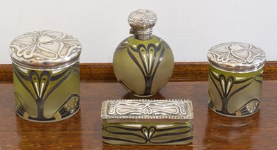 Lot 23 - An Art Nouveau silver and painted glass four-piece dressing table set.