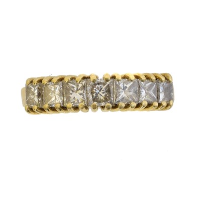 Lot 119 - An 18ct gold diamond seven stone ring.