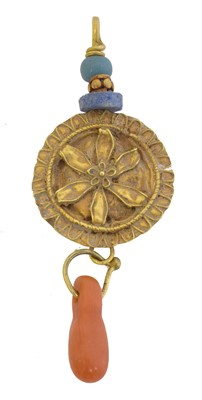 Lot 54 - An antique coral pendant.