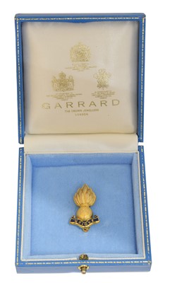 Lot 19 - A 9ct gold Garrard Royal Engineers brooch.
