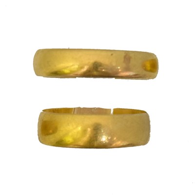 Lot 62 - Two 22ct gold band rings.