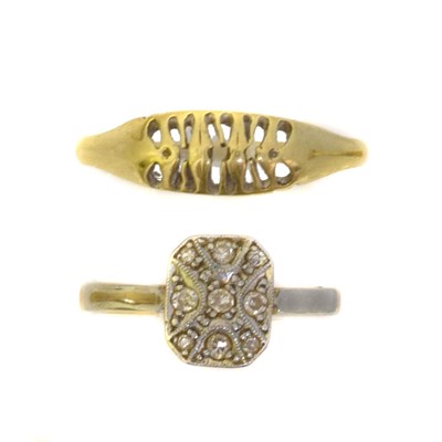 Lot 69 - Two gem-set dress rings.