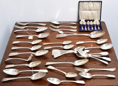 Lot 12 - A large selection of silver and white metal flatware.
