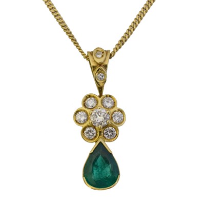 Lot 72 - An emerald and diamond pendant.