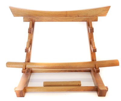Lot 127 - Walnut sword stand for three Japanese swords,...
