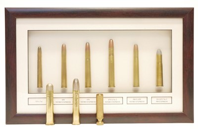Lot 440 - Framed display of six big game cartridges,...