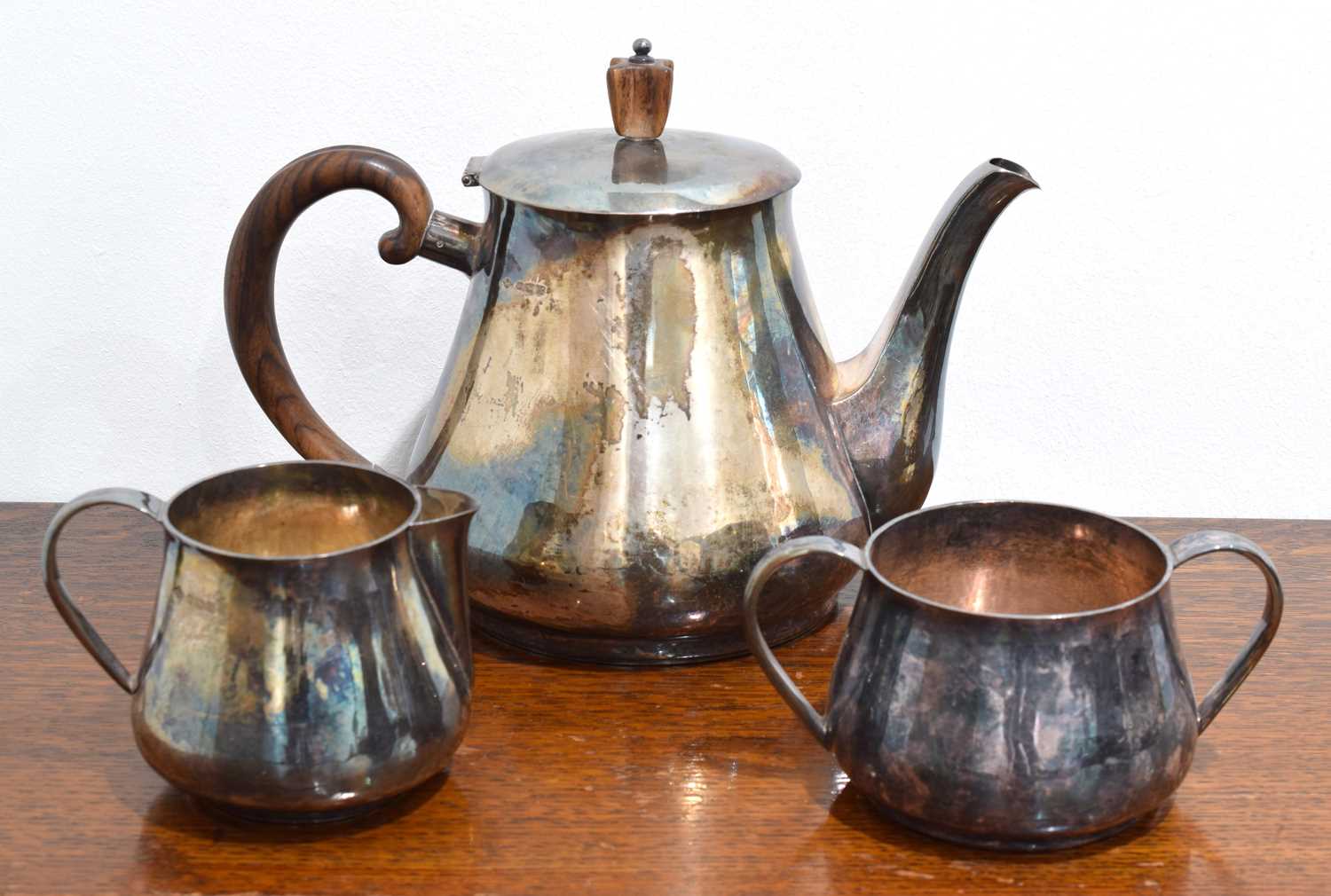 Lot 16 - An Elizabeth II silver three piece tea set.