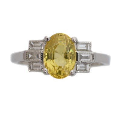 Lot 116 - A sapphire and diamond dress ring.