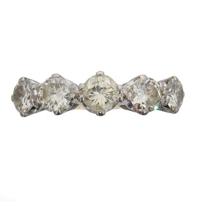Lot 135 - A diamond five stone ring.