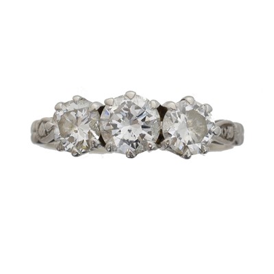 Lot 126 - A diamond three stone ring.