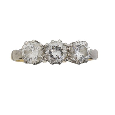 Lot 105 - A diamond three stone ring.